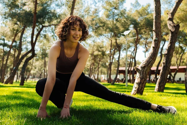 Sport People Concept Photo Athletic Female Stretch Workout City Park — стоковое фото