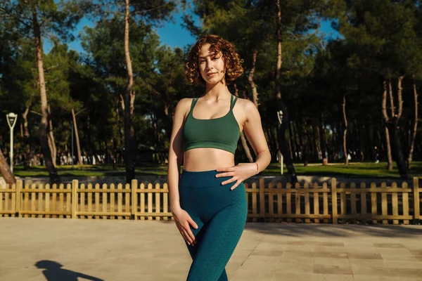 Beautiful Young Redhead Woman Wearing Green Sports Bra Blue Yoga — стоковое фото