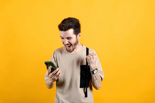 Happy Young Man Wearing Beige Shirt Posing Isolated Yellow Background — Stock Photo, Image