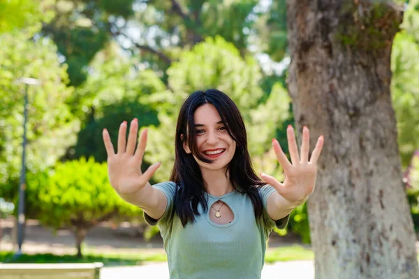 Happy Brunette Woman Wearing Turquoise Tee City Park Outdoors Showing — Fotografia de Stock