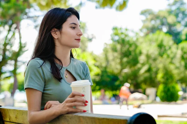 Young Caucasian Woman Wearing Tee Standing City Park Outdoors Holding — Fotografia de Stock