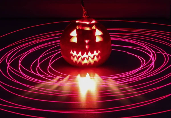 Abstraktní Světlá Malba Kolem Halloweenské Dýně — Stock fotografie