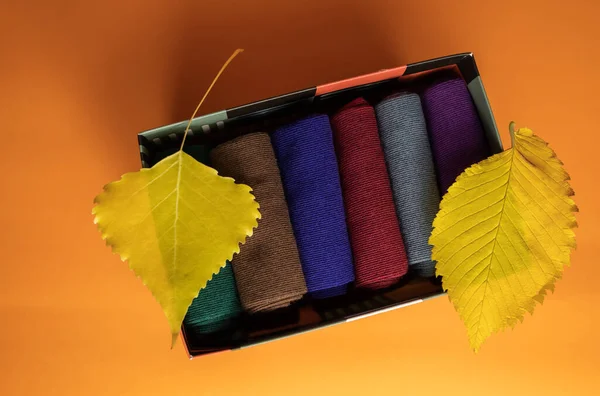 Set  of colorful socks in a box for the  autumn season