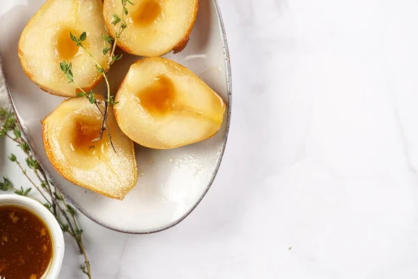 Caramelized Pear Halves Oval Grey Plate Thyme Branches Caramel White — Stock Photo, Image