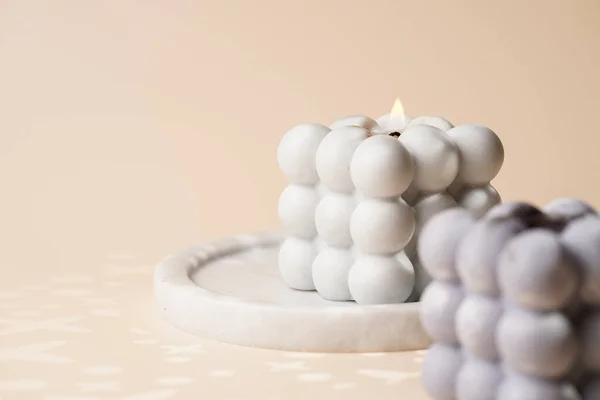 Two Grey Bubble Candles Beige Colored Seamless Surface Starry Light — Stock Photo, Image