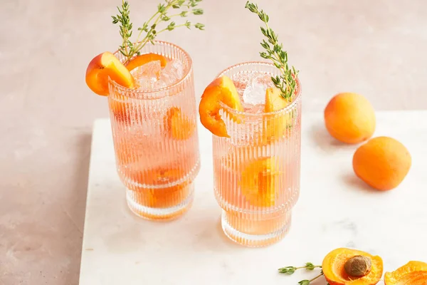 Two Glasses Refreshing Summer Cocktail Ice Cubes Apricot Slices Fresh — Stok fotoğraf