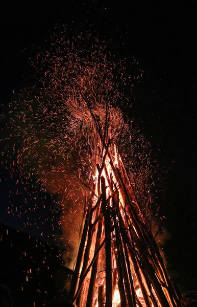 a large bonfire for the summer solstice in the Carpathians