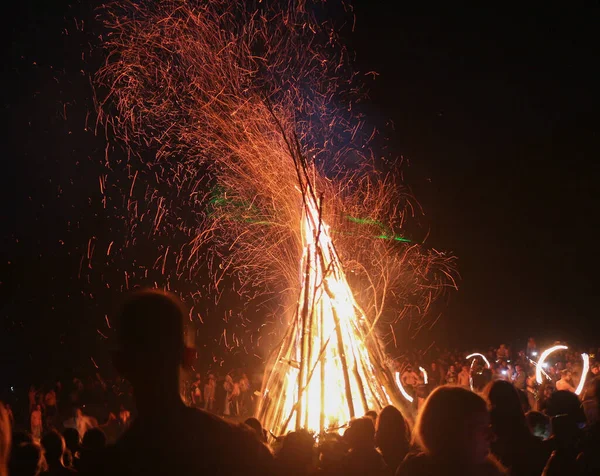 a large bonfire for the summer solstice in the Carpathians
