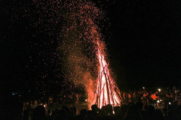 a large bonfire for the summer solstice in the Carpathians