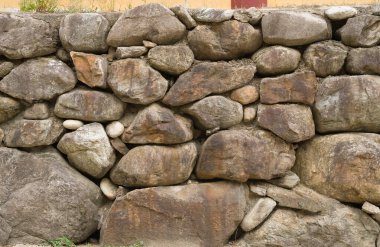 Arka plan ve doku taş duvarı. Yüksek çözünürlük