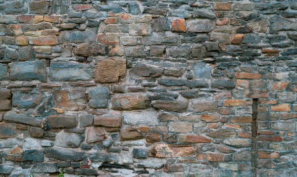 Arka plan ve doku taş duvarı. Yüksek çözünürlük