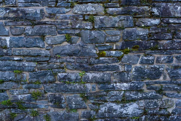 Arka plan ve doku taş duvarı. Yüksek çözünürlük