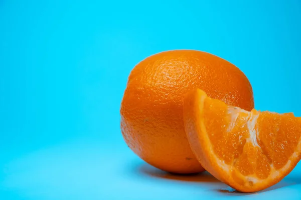 Orange Close Blue Background — стоковое фото