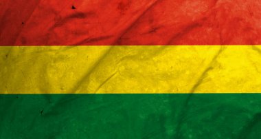 Eski kumaşta Bolivya bayrağı, toprak ve tozla dolu eski bayrak