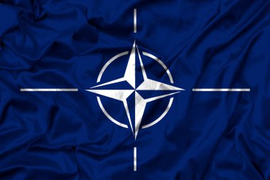Kumaş dokusunda Nato bayrağı. 3D çalışma ve 3B resim