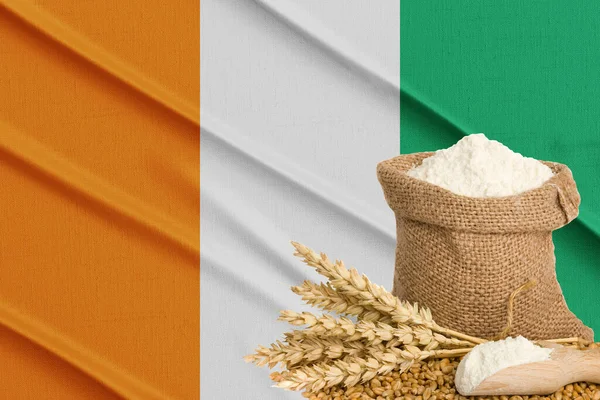 Ivory Coast grain crisis, Concept global hunger crisis,  On background Flag Ivory Coast wheat grain. Concept of growing wheat in Russia