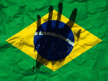 War in Brazil, concept of protest against the war, Stop the war and save lives, flag of Brazil and the symbol of the hand to stop the war.