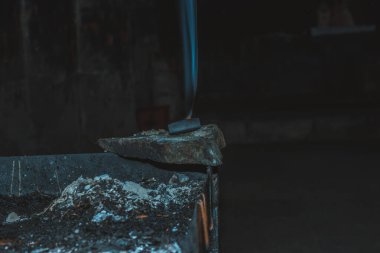 Smoking incense in the Church, the Altar in the background