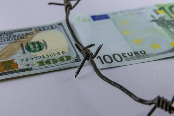 Euro Dollar Conflicts, banknote Dollar and banknote Euro, Euro vs Dollar with barbed wire, Economic crisis