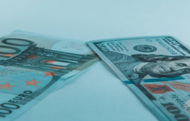 Banknotes  of 100 US dollars and 100 euros , crisis concept, sanction all the world