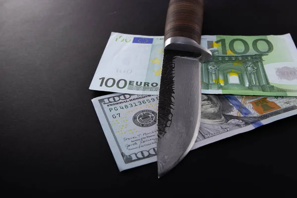 Euro Dollar Conflicts, banknote Dollar and banknote Euro, Euro vs Dollar a knife divided, Economic crisis