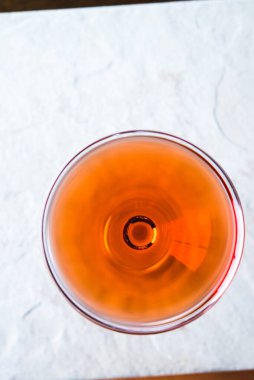 Boulevardier cocktail served up on white ceramic background