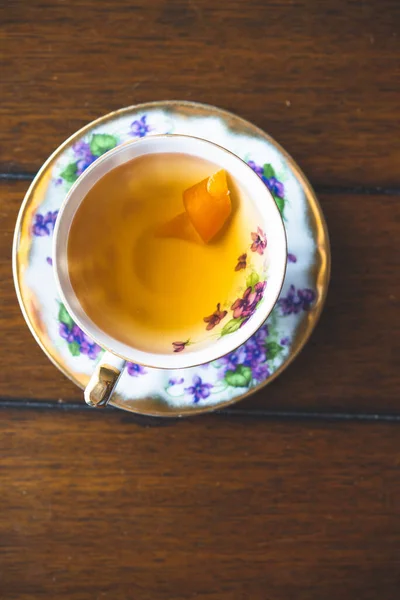 Cocktail served in a vintage tea cup 