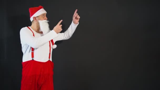 Babbo Natale giallo funky elegante, bretelle veloce sfondo uomo dicembre cappello rosso allegro, punti su uno sfondo nero — Video Stock