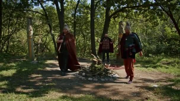 Mystical fraternal rite on the blood of two warriors. the priestess and the shaman supervise the execution process. — Video