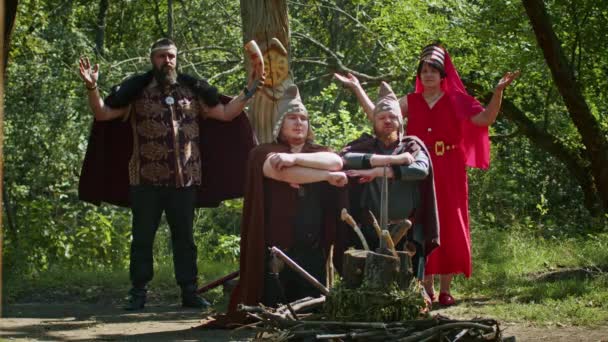 Mystical fraternal rite on the blood of two warriors. the priestess and the shaman supervise the execution process. — Video