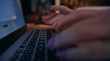 close-up. the girls fingers are typing on the computer keyboard. business time. rest and work