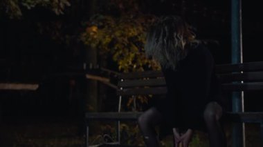 cinematic shot, the awakening of a creepy zombie woman, runs out of the dark and attacks. horror. halloween. real evil.
