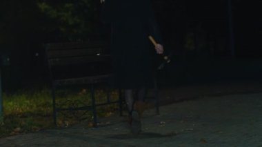 cinematic shot, a man walks through a dark forest, a creepy zombie woman runs out of the darkness and attacks. horror. halloween. real evil.