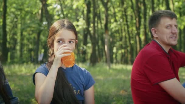 Young Woman Drinking Juice Forest Family Camping — Stock Video