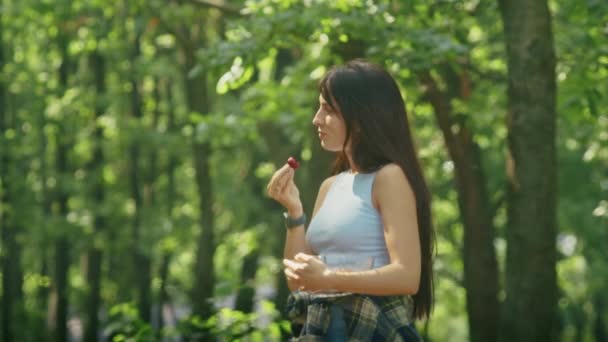 Happy Woman Enjoying Eating Ripe Strawberries While Standing Forest Family — Stok video