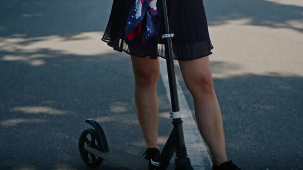 Playful Girl Enjoys Summer Rides Scooter Park City Streets — 图库视频影像