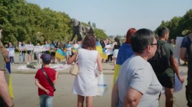 Ukrainian women and men gathered for a peaceful rally in support of the Azov prisoners of war, and the victims in Olenevka and Mariupol, demand the release of prisoners. Rally for freedom. No war in