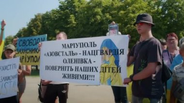 Ukrainian women and men gathered for a peaceful rally in support of the Azov prisoners of war, and the victims in Olenevka and Mariupol, demand the release of prisoners. Rally for freedom. No war in