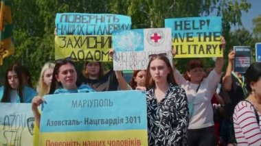 Ukrainian women and men gathered for a peaceful rally in support of the Azov prisoners of war, and the victims in Olenevka and Mariupol, demand the release of prisoners. Rally for freedom. No war in