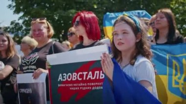 Ukrainian women and men gathered for a peaceful rally in support of the Azov prisoners of war, and the victims in Olenevka and Mariupol, demand the release of prisoners. Rally for freedom. No war in