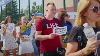 Ukrainian women and men gathered for a peaceful rally in support of the Azov prisoners of war, and the victims in Olenevka and Mariupol, demand the release of prisoners. Rally for freedom. No war in