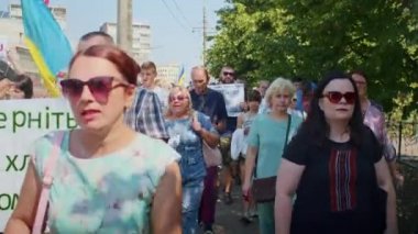 Ukrainian women and men gathered for a peaceful rally in support of the Azov prisoners of war, and the victims in Olenevka and Mariupol, demand the release of prisoners. Rally for freedom. No war in