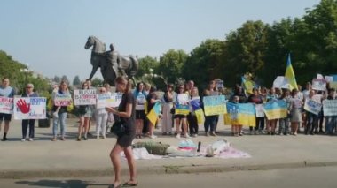 Ukrainian women and men gathered for a peaceful rally in support of the Azov prisoners of war, and the victims in Olenevka and Mariupol, demand the release of prisoners. Rally for freedom. No war in