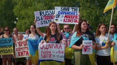 Ukrainian women and men gathered for a peaceful rally in support of the Azov prisoners of war, and the victims in Olenevka and Mariupol, demand the release of prisoners. Rally for freedom. No war in