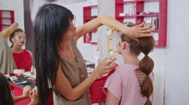 cosmetics and work as a stylist and makeup artist, women paint lips, eyes, face,