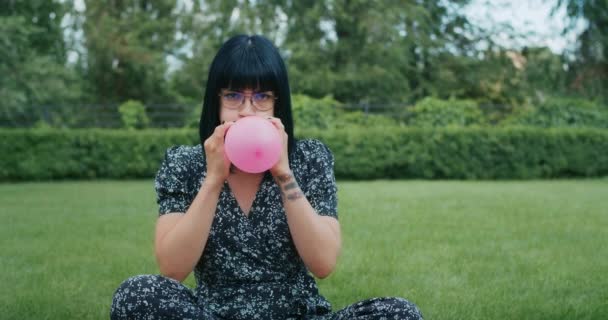 Happy Joyful Woman Inflates Balloons Burst Showing Everything Wrong Condoms — Stock video