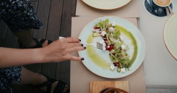 Cheerful Woman Enjoys Food Restaurant She Eats Pleasure Fills Her — Vídeo de Stock