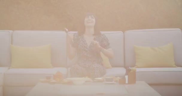 Cheerful Woman Enjoys Food Restaurant She Eats Pleasure Fills Her — Wideo stockowe