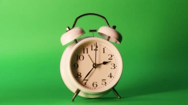 analog clock goes on a green screen, timelapse, fast passage of time