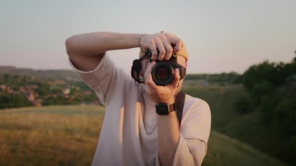 Happy Male Photographer Sunset — Stockvideo